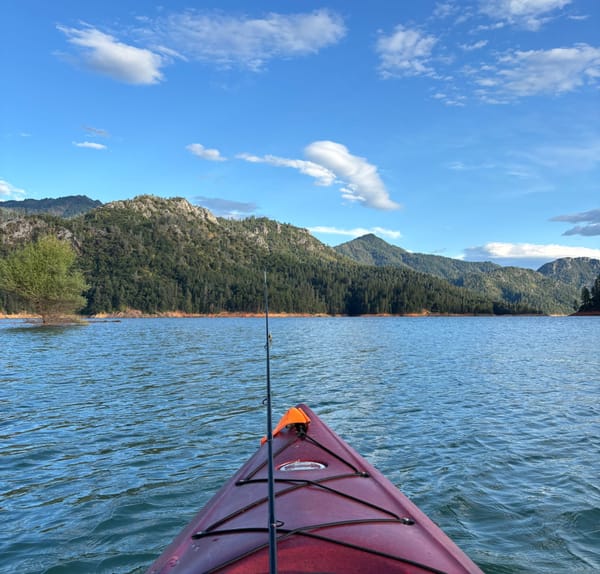 Kayak fishing at Shasta Lake near Hirz Bay